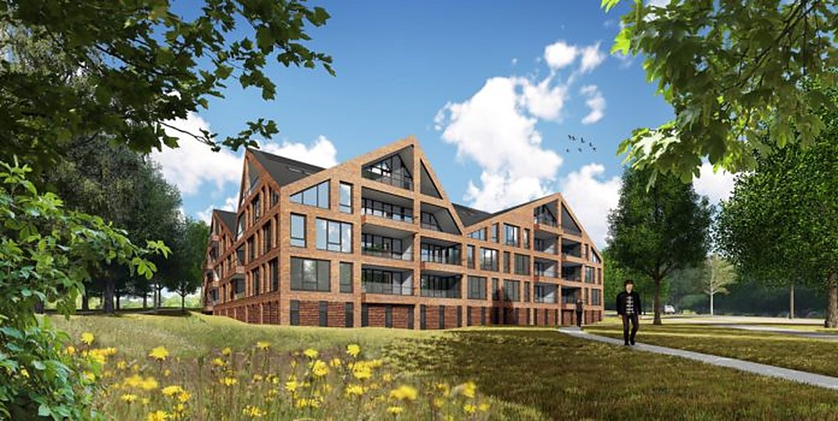 Woongebouw met bakstenen gevel en balkons