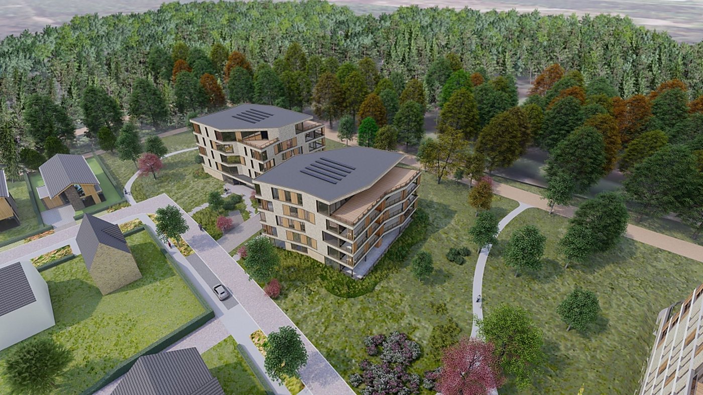Appartementencomplex aan de bosrand met zonnepanelen op het dak